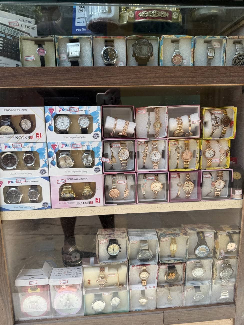 Display case of boxed watches at Clock House