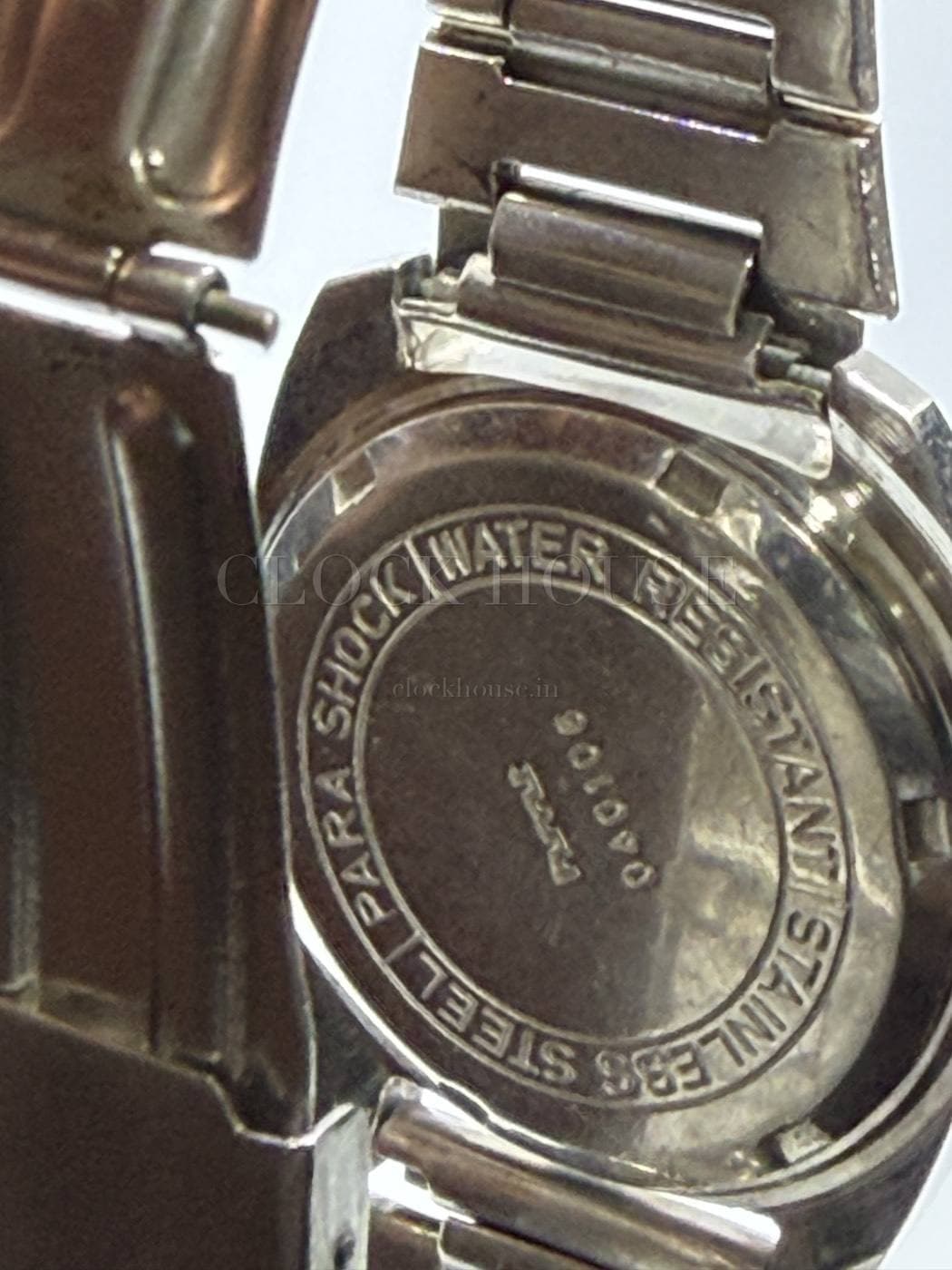 HMT Sundar caseback: Para Shock, water resistant, stainless steel, serial 040106